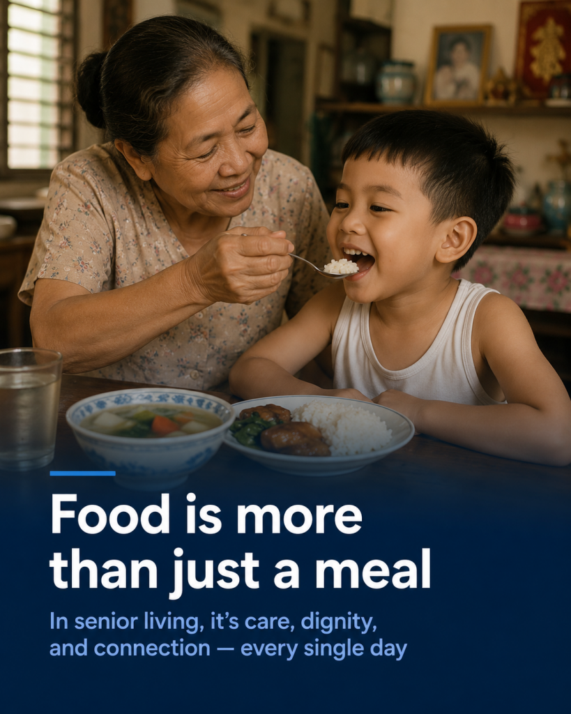 An older woman happily sharing a meal with a young boy. Text overlay reads: "Food is more than just a meal. In senior living, it's care, dignity, and connection every single day.